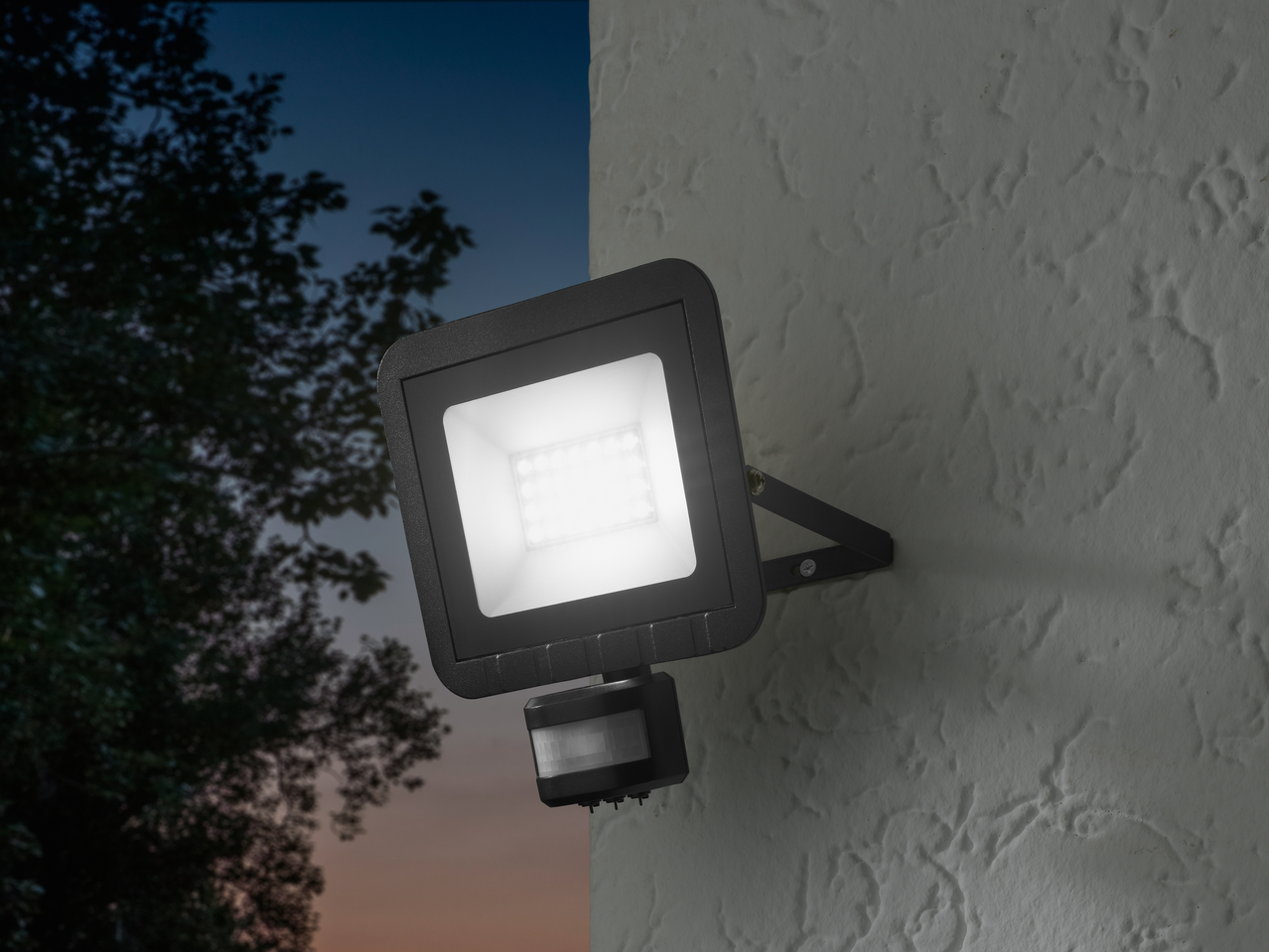 Outdoor LED floodlight with motion sensor.