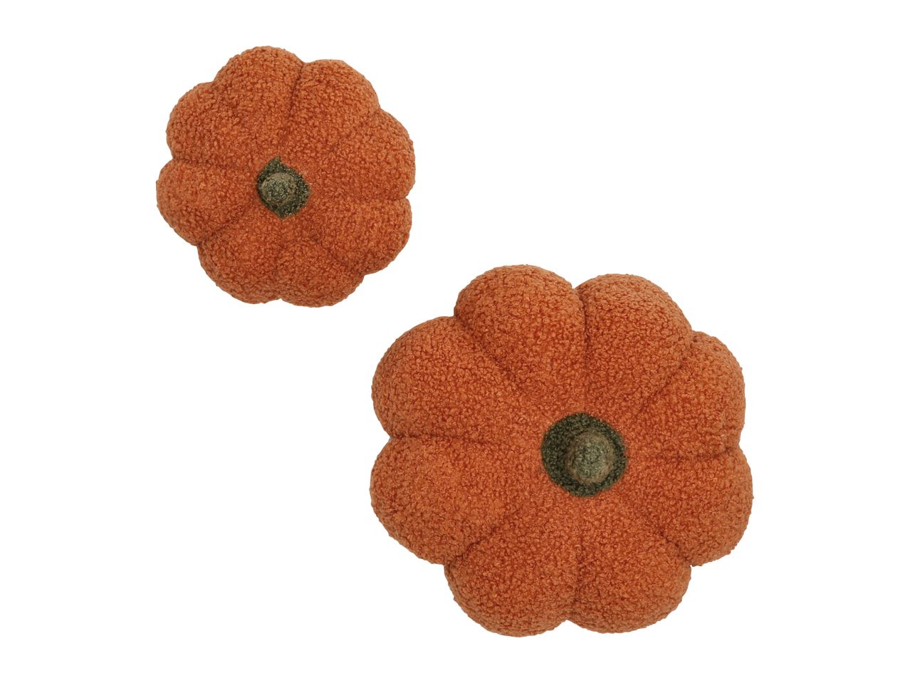 Two orange pumpkin-shaped decorative pillows with green stems.