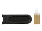 A black textured tool accessory and a clear bottle of liquid with a white cap.