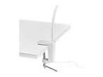White clamp-on desk lamp attached to a white desk with a visible power cord.
