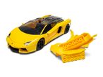 Yellow toy sports car with a partially disassembled chassis on a white background.
