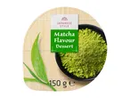 Matcha flavour dessert powder in a bowl with tea leaves on a bamboo mat, 150g.