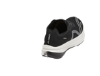 Crivit running shoes in black and white with reflective details.