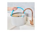 Hand holding a white mop bucket with a blue handle, filling with water from a copper faucet.