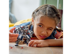 Girl playing with a LEGO Marvel robot.