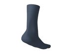 A single dark blue sock, standing upright, with a ribbed cuff and smooth foot.