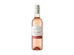 En flaske rosévin med en hvid etiket, der læser 'Oui, Jolie! Rosé' og 'L'EAU D'ÉTÉ FRANÇAISE'.