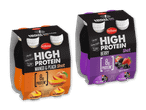 To 4-pakker med proteinshots, en med smag af mango og fersken og en med bærsmag, begge med 8g protein per flaske.