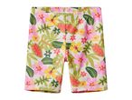 Children's swim shorts with a vibrant tropical floral pattern in pink, yellow, and green.