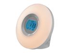 Wake-up light alarm clock with a glowing ring and digital display