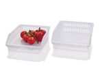 Two clear plastic refrigerator bins with ventilation, one containing strawberries.