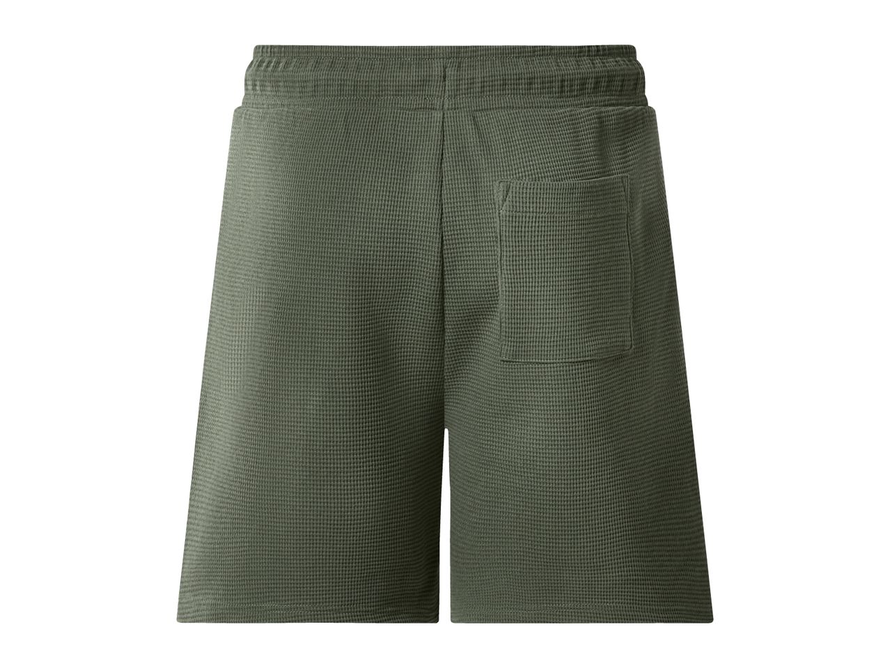 Men's green waffle knit shorts with an elastic waistband and a back pocket.