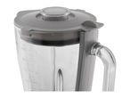 Close-up of a glass blender jug with a grey lid and measurement markings