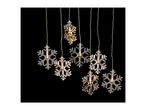 Illuminated snowflake string lights on a black background