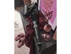 Cien Beauty hot air styler with various hair styling accessories and slippers on a dark surface.